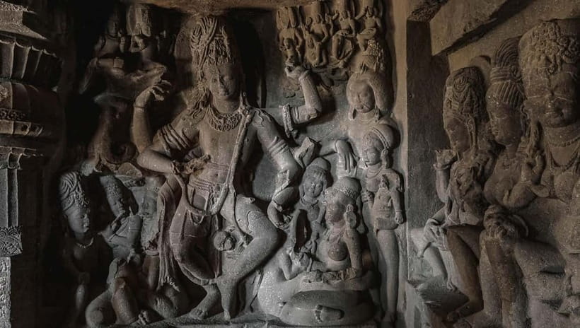 Ajanta & Ellora : Day Tour from Mumbai with Flight Tickets - Getting around cave sites: slippers, light, and patience