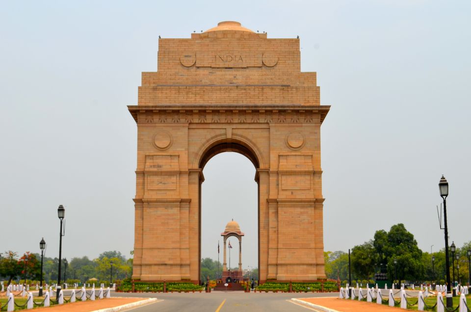 Delhi Half-Day Private City Tour with Car & Guide - New Delhi route: Qutb Minar, Humayun’s Tomb, Lotus Temple, India Gate, and Parliament House drive-by