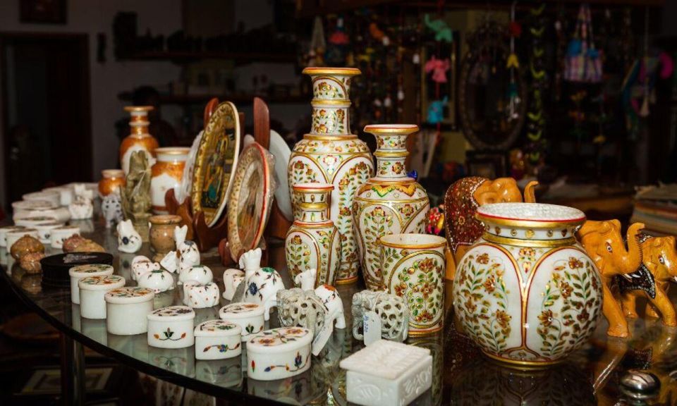 Delhi: Half day Shopping tour with guide by car. - Key Stops That Make This Tour Worth It