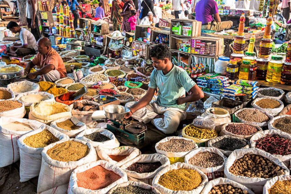 Delhi: Half day Shopping tour with guide by car. - Dilli Haat and a Cottage Emporium: Where Indian Crafts Meet Gift-Ready Buying